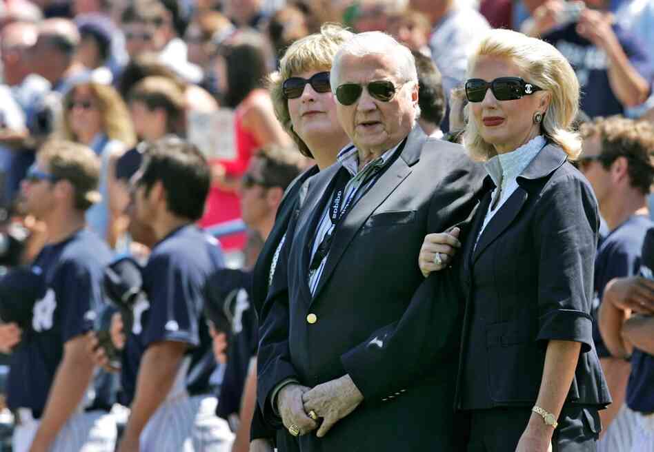 Steinbrenner stands with his two daughters, Jessica Steinbrenner (left) and Jennifer Steinbrenner Swindal, during the national anthem after a pregame ceremony renaming Legends Field to George M. Steinbrenner Field in Tampa, Fla., March 27, 2008. 