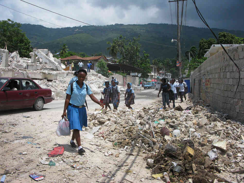 Despite the rubble and lack of permanent housing, a positive sign is the vast number of children who have been able to return to school. 