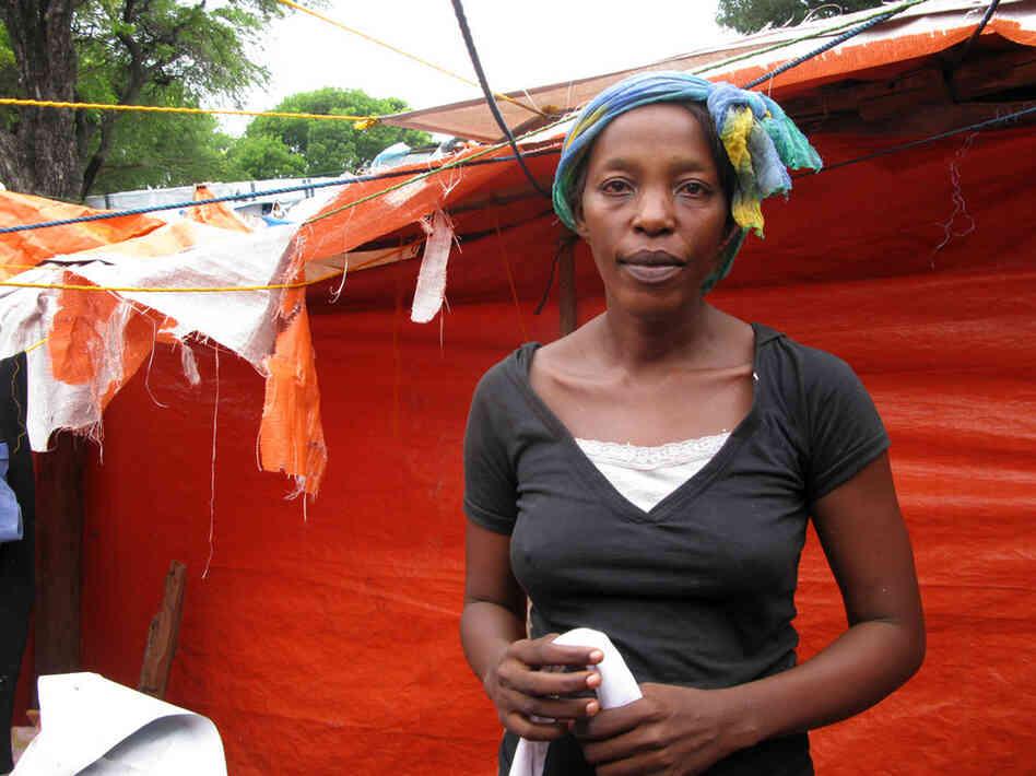 Marie Jules St. Julius lives in a tent in the Petionville Club camp, but she sent her two teenage children to live in the countryside with relatives. She divides her time, spending two weeks at the camp  — where she sells bags of chips, gum, cookies and cigarettes — and two weeks with her children. 