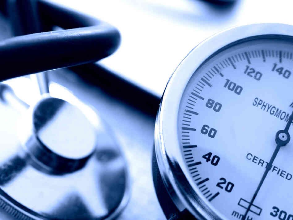 A blood pressure gauge and stethoscope A blood pressure gauge and stethoscope