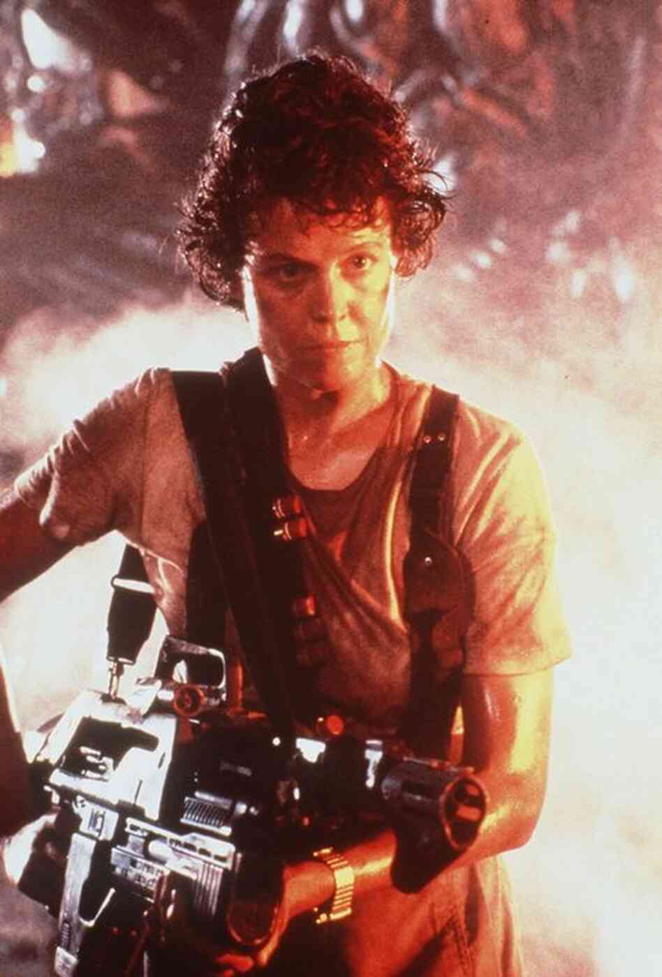 That distinction may belong to Sigourney Weaver, who in 1979's Alien proved women can be tougher than men when it comes to fighting extraterrestrials with acid for blood. Alien's producers intentionally made Ripley a woman to subvert science-fiction conventions — though the 1986 sequel backtracked by setting up a mechanized catfight between Ripley and the alien queen. 