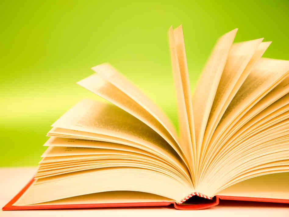 open hardcover book open hardcover book
