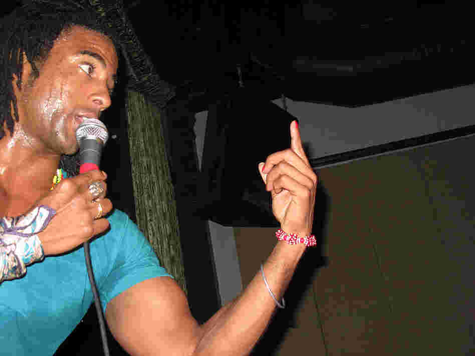 Don't mess with Yotuel: The man dares to wear fucsia nail polish.