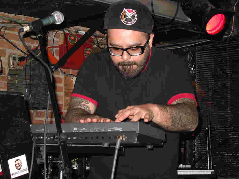 Chico Mann works hard at making the audience get down.