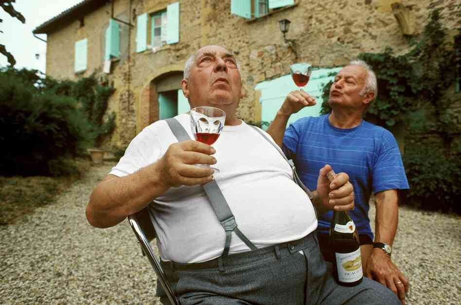 At the 1932 Los Angeles Olympics, Maurice Perrin and Louis Chaillot of France received the gold medal for tandem bicycle racing. Years later, on the eve of the 1984 Olympics, they toast at Perrin's vineyard in Beaujolais, France. 