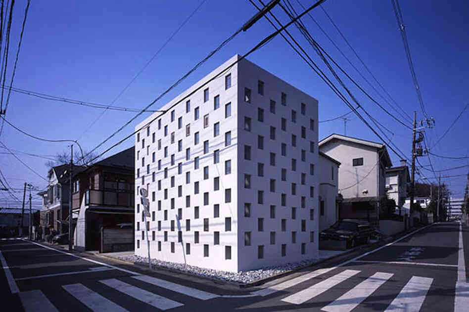 "Cell Brick" (exterior) is a three-story micro house in Tokyo built in 2004. Architect Yasuhiro Yamashita says he "cross-stitched" steel and glass to create the eye-catching facade.