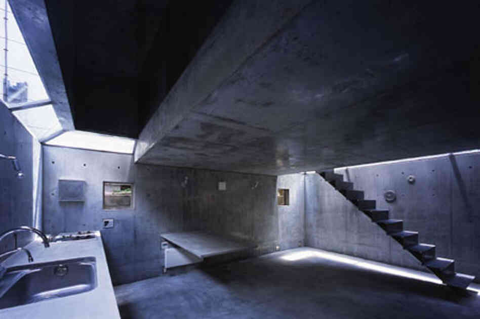 The homeowners originally requested that even interior fixtures, right down to the bathtub, be fashioned from concrete, but for cost reasons had to settle for just dining table and kitchen counters.