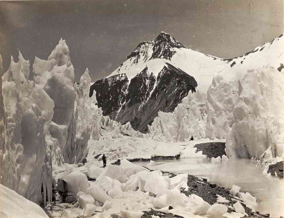 An unidentified Everest team member moves through ice pinnacles in the East Rongbuk Glacier, a necessary corridor leaving to Everest 