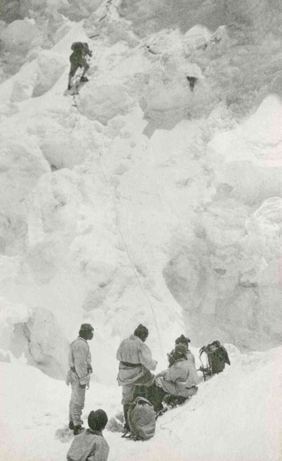 The 1924 expedtion crew climbs the North Col, the pass connecting Mount Everest and the mountain Changtse in Tibet. 
