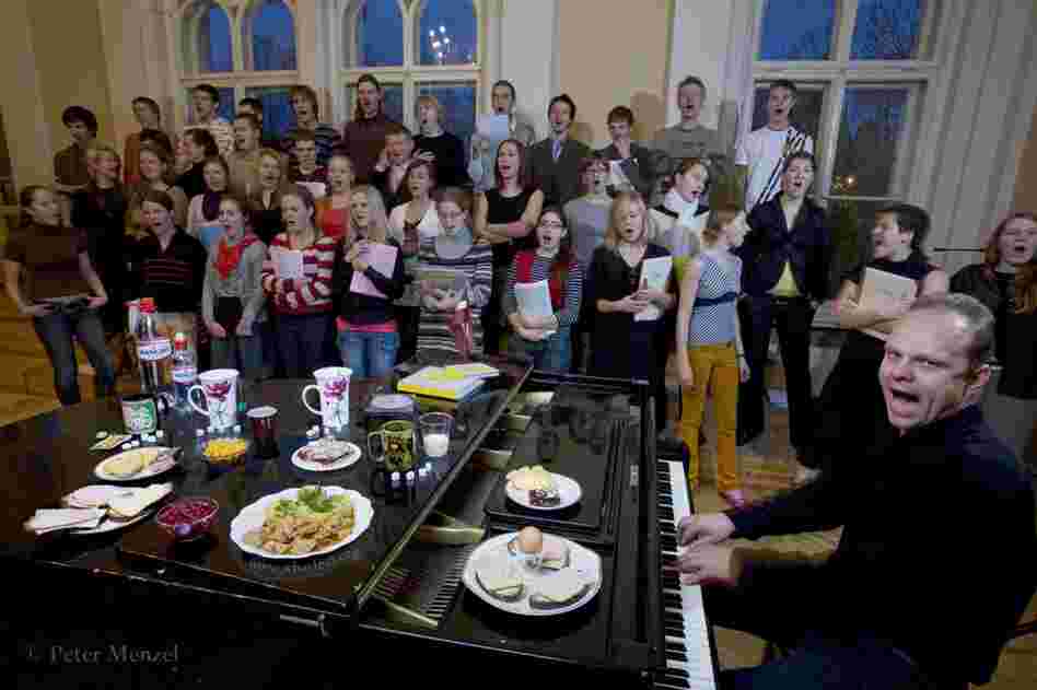 Ansis Sauka, a voice teacher, musician and composer, rehearses with the Riga youth choir in Latvia. He is 36 years old, about 6 feet tall, 183 pounds, and on a typical October day, he consumed 3,900 kcals. Some of his food: egg, rye bread with ham, cheese and butter, chicken, potato with mayonnaise, cookies.