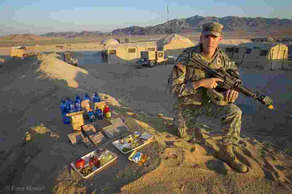 Curtis Newcomer, a U.S. Army soldier, with a typical day of food at the National Training Center at Fort Irwin in California's Mojave Desert. He is 20 years old, 6 foot 5 and 195 pounds; his caloric intake on a typical day in September was 4,000 kcals. His lunch consists of a variety of instant meals in the form of MREs (meals ready to eat). His least favorite is the cheese and veggie omelet.
