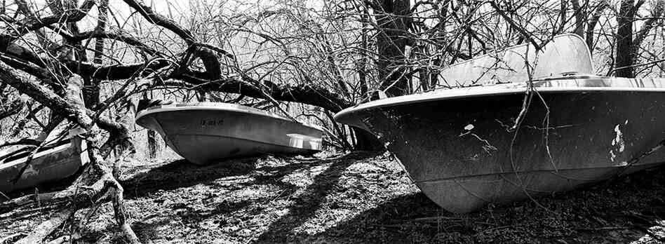Old boats at the edge of a field on the James family's property.