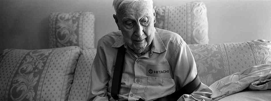 Longtime Utica resident Curtis Hooper, 96, on the couch in his home, died two months after this photo was taken.