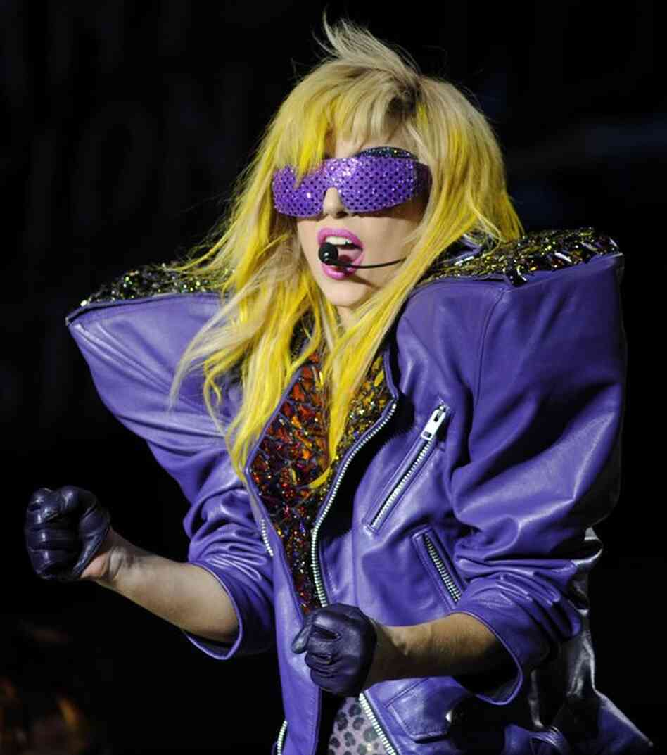 Lady Gaga in one of many wigs and sunglasses she'd wear onstage at Lollapalooza August 6, 2010. 