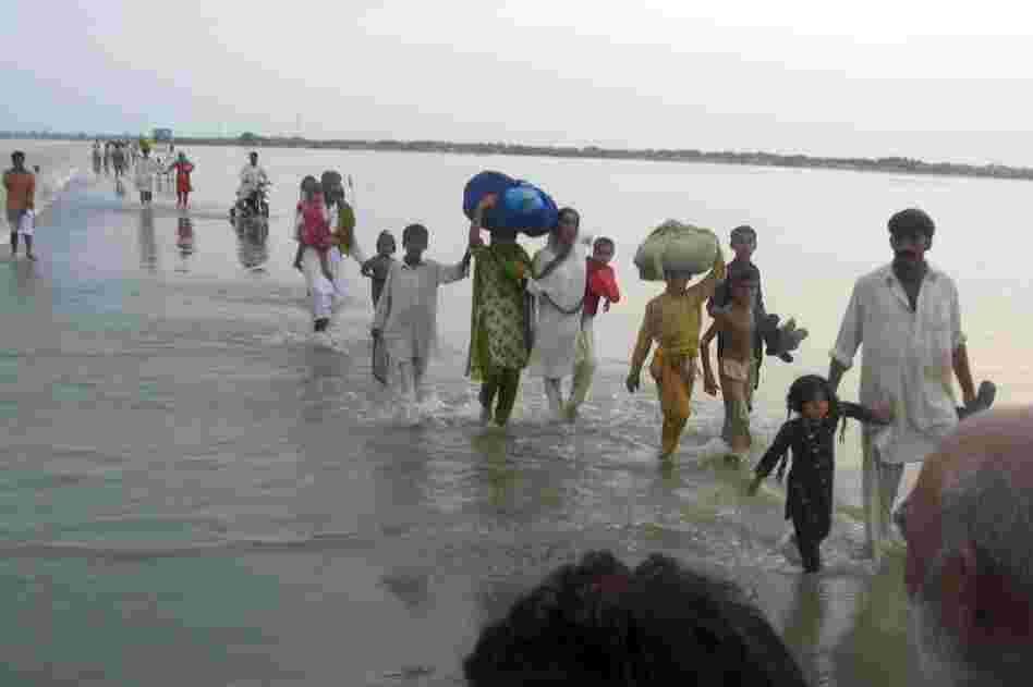 Floods have ravaged Pakistan's southern Punjab province, destroying homes, stranding people, and damaging more than 20 percent of its cotton crop.
