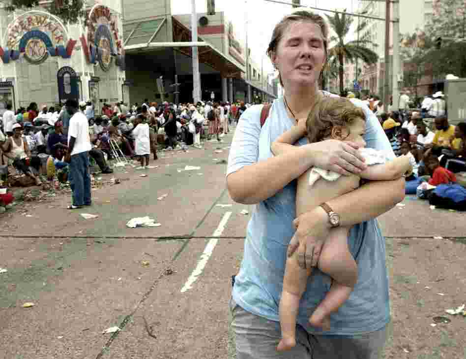 Lee Ann Bemboom seeks help for her 11-month-old son Jahon who became dehydrated while they were stranded for days at the Ernest N. Morial Convention Center on Sept. 1, 2005. After waiting in vain, she left looking for help elsewhere. 