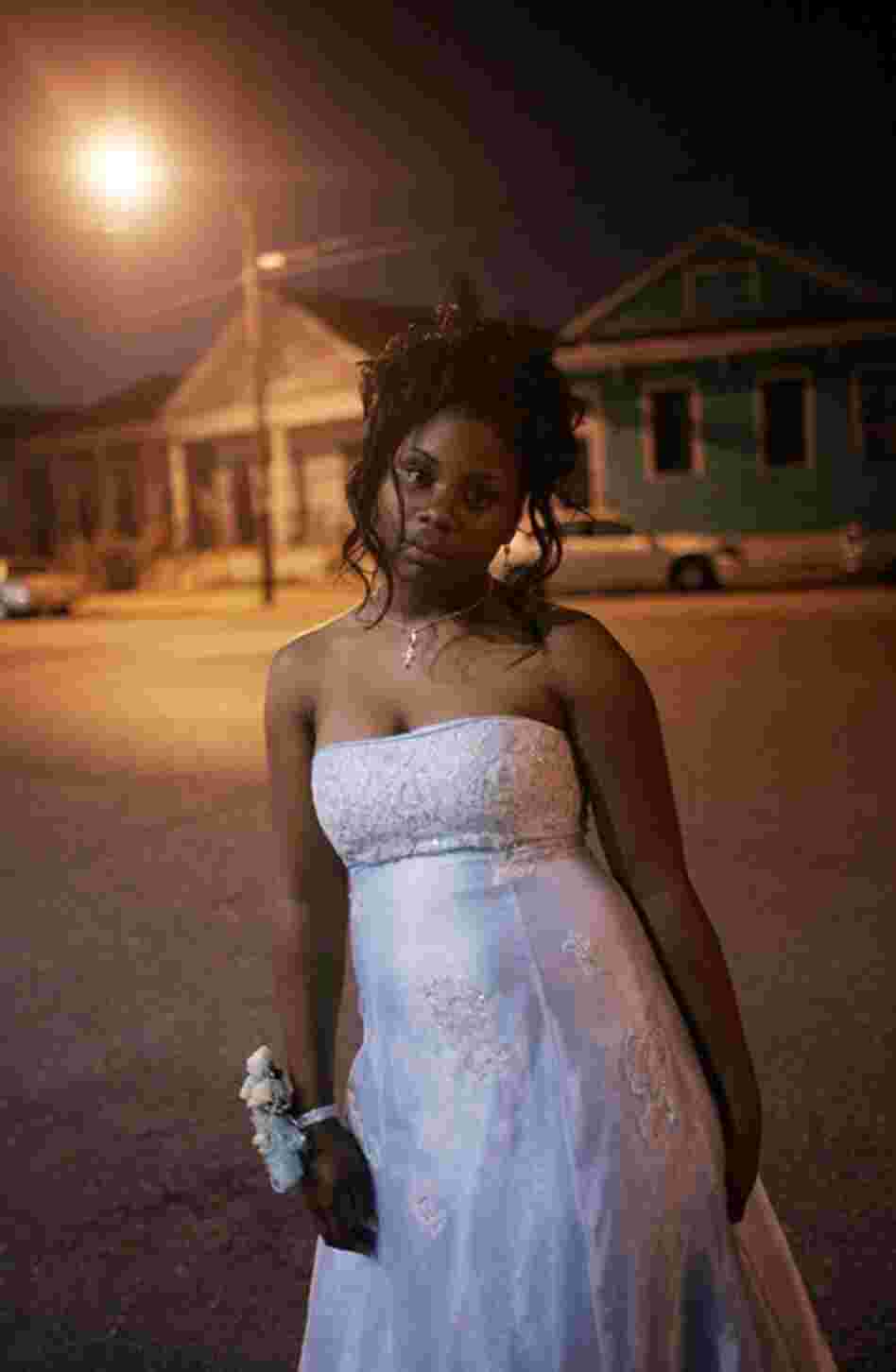 Kirrione Jones stands outside John McDonogh High School after attending her prom June 1, 2007, in New Orleans. It was the first prom at the struggling inner-city school since Hurricane Katrina.