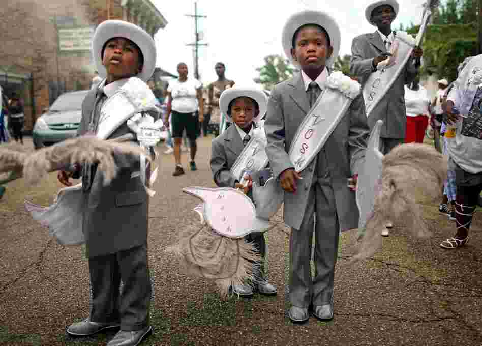 Young boys participate in the Valley of Silent Men Social Aid and Pleasure Club second line parade Aug. 26, 2007, in New Orleans. The second line parade is a New Orleans African-American tradition whose numbers dwindled following Hurricane Katrina.