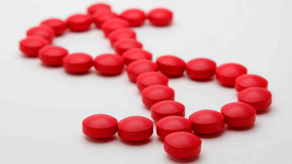 dollar sign made of pills dollar sign made of pills