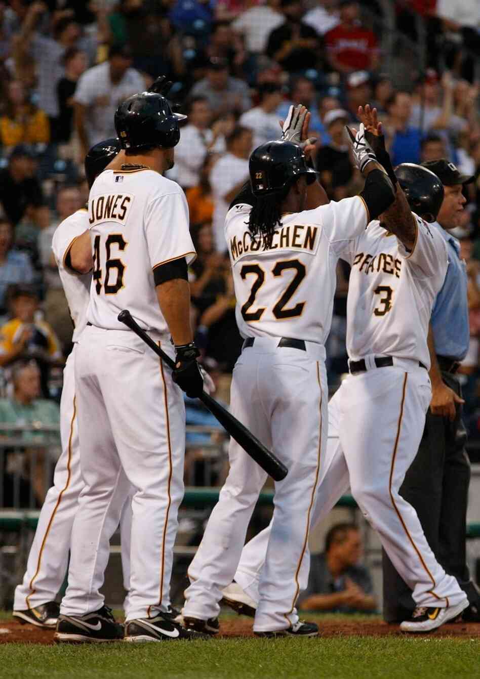 Pittsburgh Pirates players celebrate a play. Jared Wickerham/Getty Images Pittsburgh Pirates players celebrate a play. Jared Wickerham/Getty Images