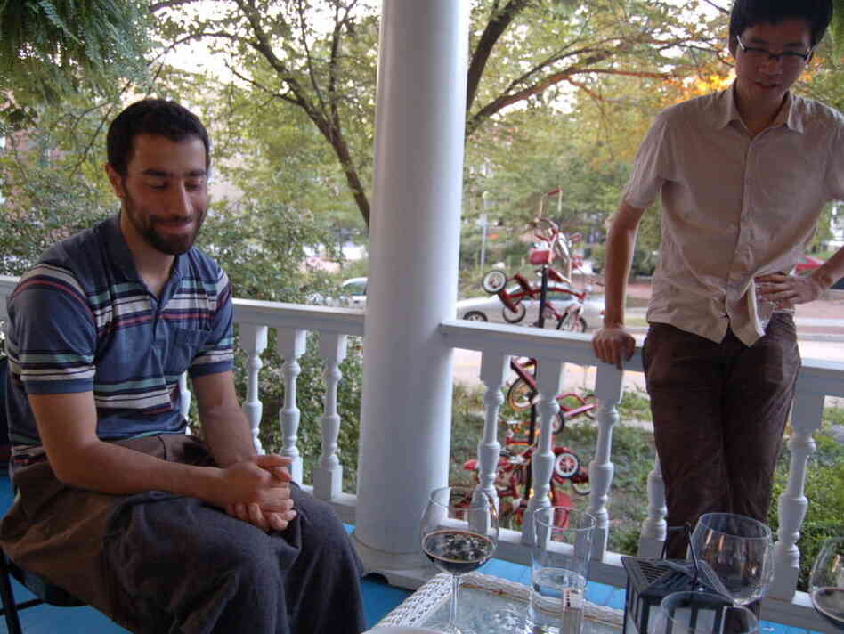 It was a little buggy on the front porch, so Patrick lent Orr his sweater to cover his mosquito-bitten legs. It was a little buggy on the front porch, so Patrick lent Orr his sweater to cover his mosquito-bitten legs.