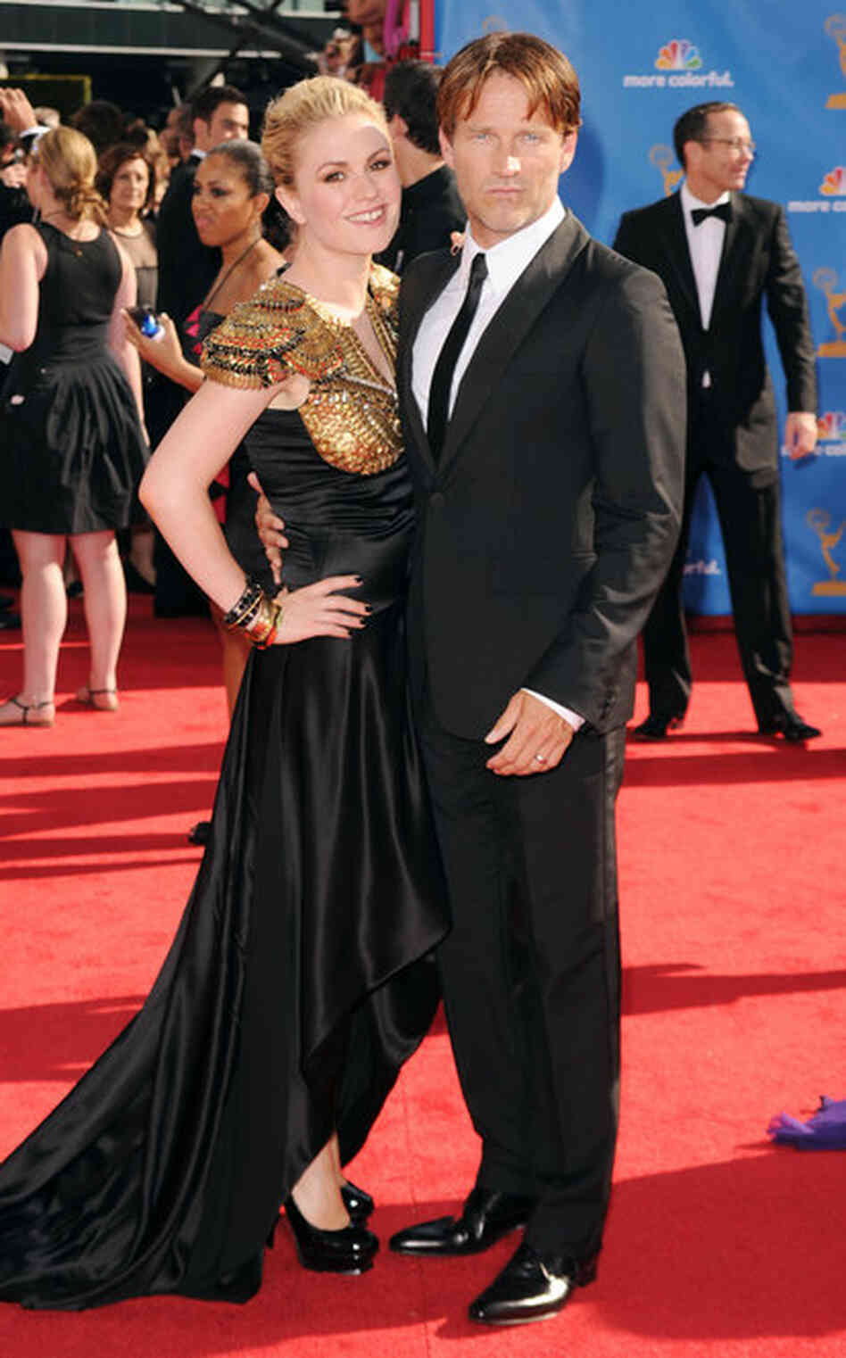 Actors Anna Paquin, left, and Stephen Moyer, from the HBO series True Blood, arrive at the Emmy Awards.  