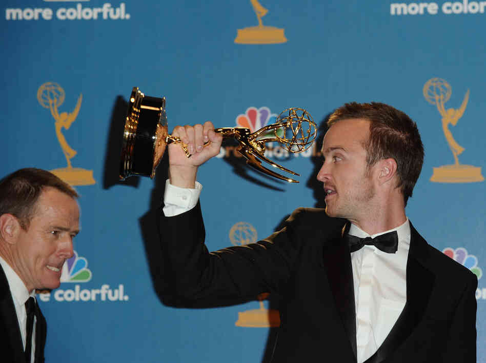 Actor Bryan Cranston poses with fellow Breaking Bad actor Aaron Paul, winner of the Outstanding Supporting Actor in a Drama Series Award. 