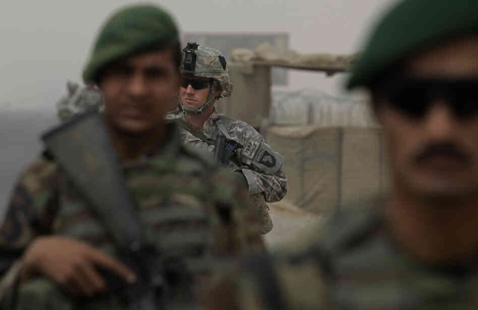 U.S. Army 1s Lt. Blair Downey on patrol with Afghan army soldiers in Kandahar province. U.S. Army 1s Lt. Blair Downey on patrol with Afghan army soldiers in Kandahar province.