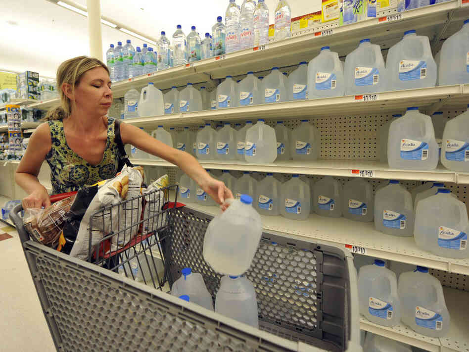 Kerry Hosek of Bay Shore, N.Y., stocks up on water in advance of Earl's arrival. Kerry Hosek of Bay Shore, N.Y., stocks up on water in advance of Earl's arrival.