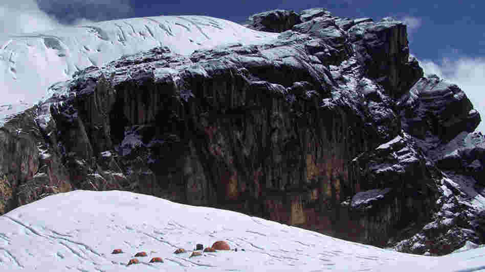 Base camp sits below a massif bearing one of the upper ice fields. Base camp sits below a massif bearing one of the upper ice fields.