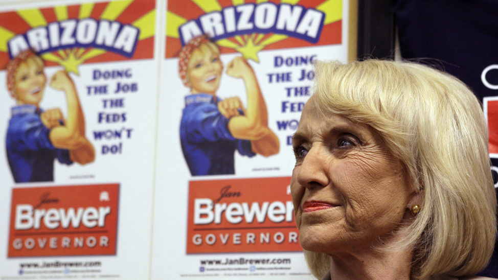 Arizona Gov. Jan Brewer's supporters say that with the immigration law, she's been doing the federal government's work for it.