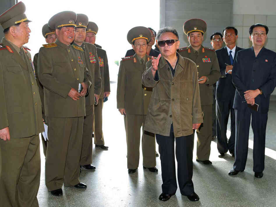 North Korean leader Kim Jong-Il (C) visiting the Taedonggang Combined Fruit Farm in Pyongyang. North Korean leader Kim Jong-Il (C) visiting the Taedonggang Combined Fruit Farm in Pyongyang.