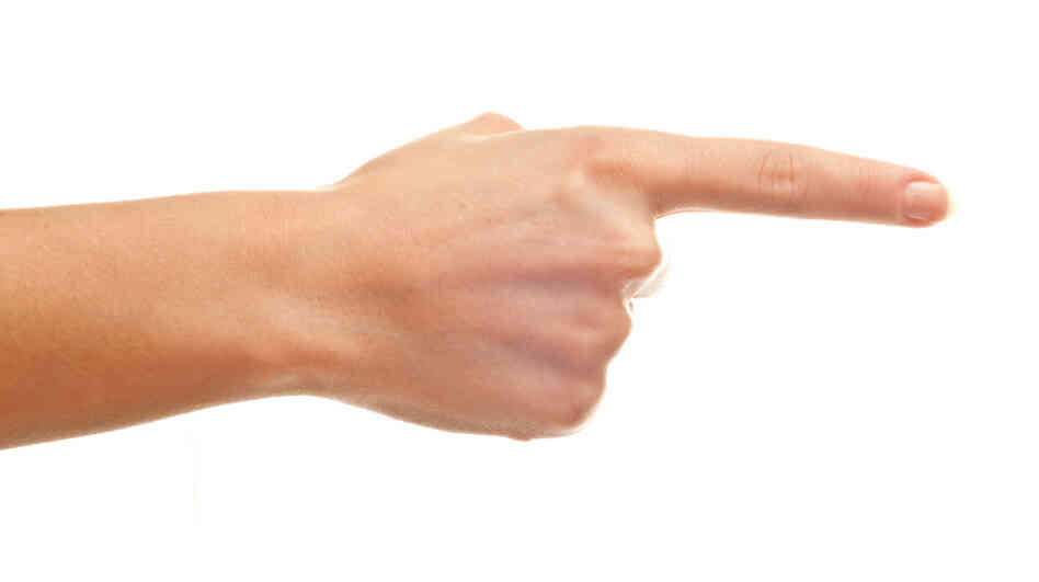 A woman's pointing finger. A woman's pointing finger.