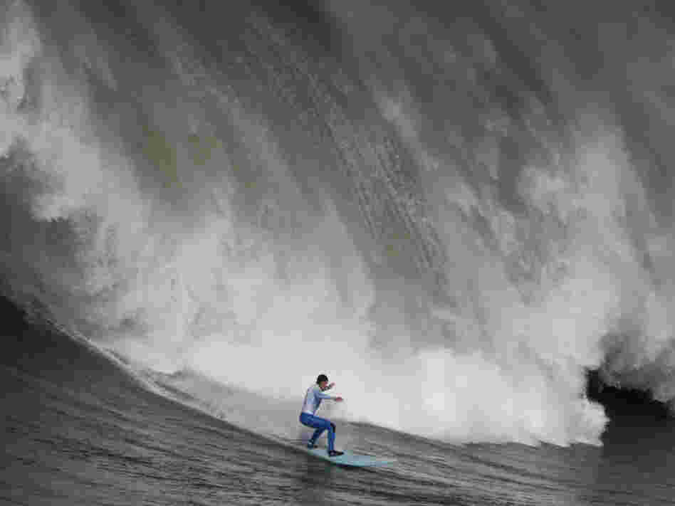 Shane Desmond surfs a wave off the coast of Half Moon Bay, Calif.