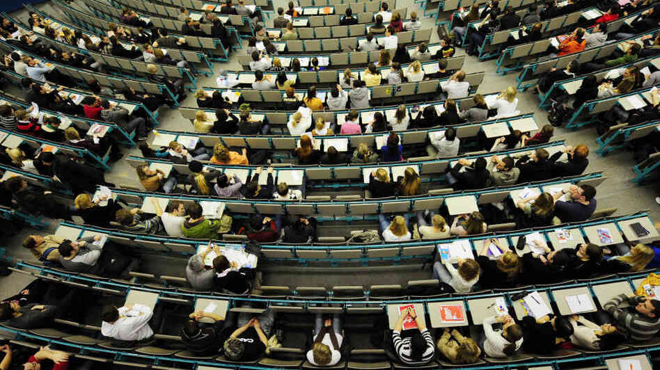 New students sit and wait to be welcomed New students sit and wait to be welcomed