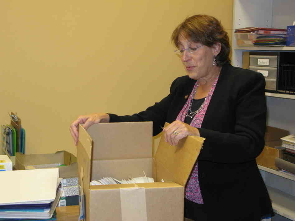 Illinois State Rep. Sandy Cole unpacks in her new office after being evicted from her other office. Illinois State Rep. Sandy Cole unpacks in her new office after being evicted from her other office.