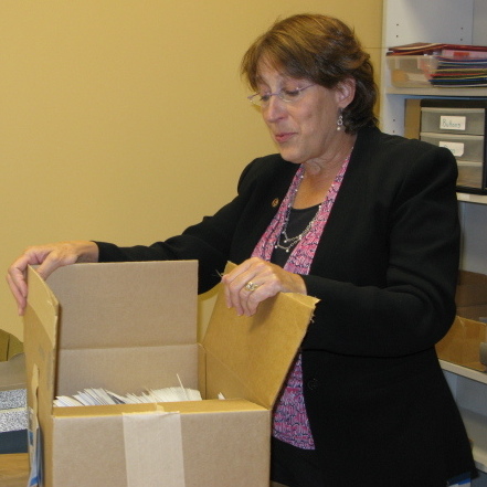 Illinois State Rep. Sandy Cole unpacks in her new office after being evicted from her other office.