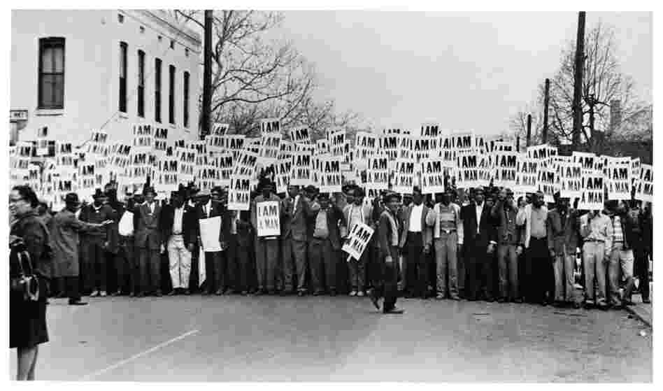 One of Withers' most iconic photographs: Sanitation workers assemble in front of Clayborn Temple for a solidarity march, Memphis, Tenn., 1968.