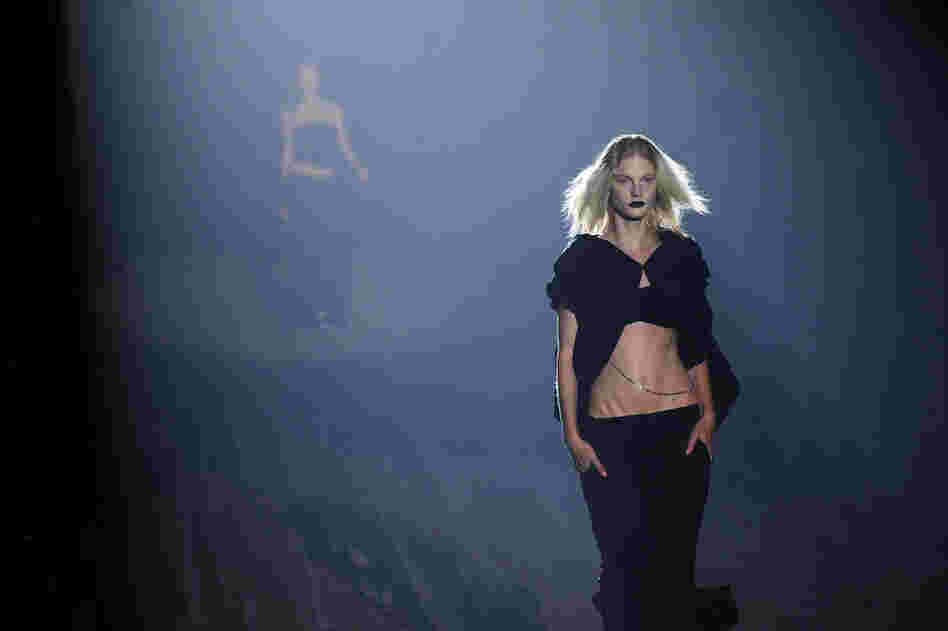 The new fashion season is under way and ready to make its mark on both the high-fashion world and that of cheap knockoffs. Here, a model shows off a creation by fashion house Y-3 during Mercedes-Benz Fashion Week in New York on Sunday. 