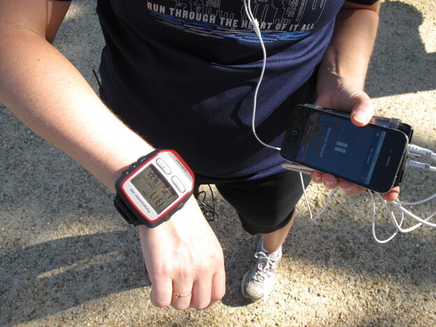 NPR's Tamara Keith shows off her Garmin GPS watch and iPhone running app.
