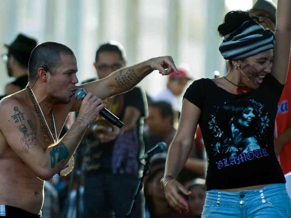 Puerto Rican singer Rene Perez (L) aka Puerto Rican singer Rene Perez (L) aka