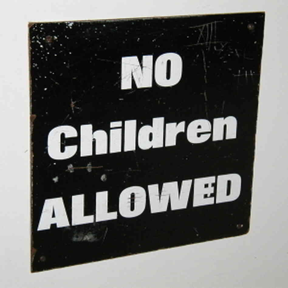 Sign reads: No children allowed. Sign reads: No children allowed.