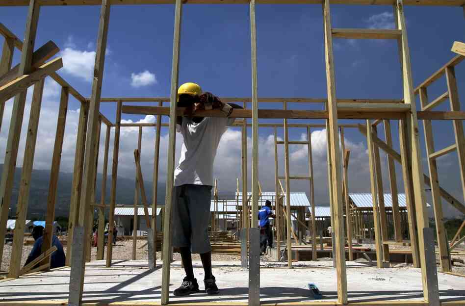 A construction worker hired by Concern Worldwide takes a break.