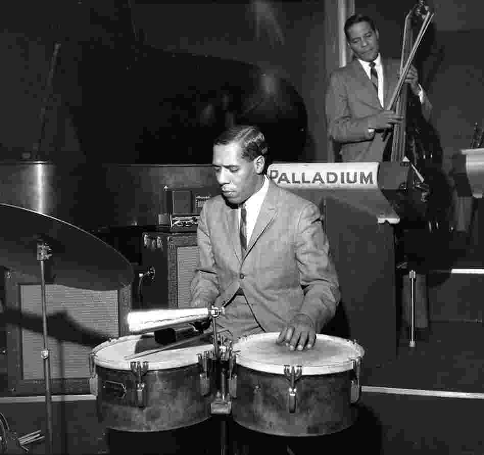 Papi Pagani, the son of Federico, along with Julian Dino with the Tito Rodriguez band at the Palladium Ballroom, New York City, circa 1962. Federico Pagani was a dance promoter who often booked the bands that appeared at the Palladium. Tito Rodriguez was considered one of the Big Three that dominated the Palladium sound, along with the orchestras of Tito Puente and Machito.