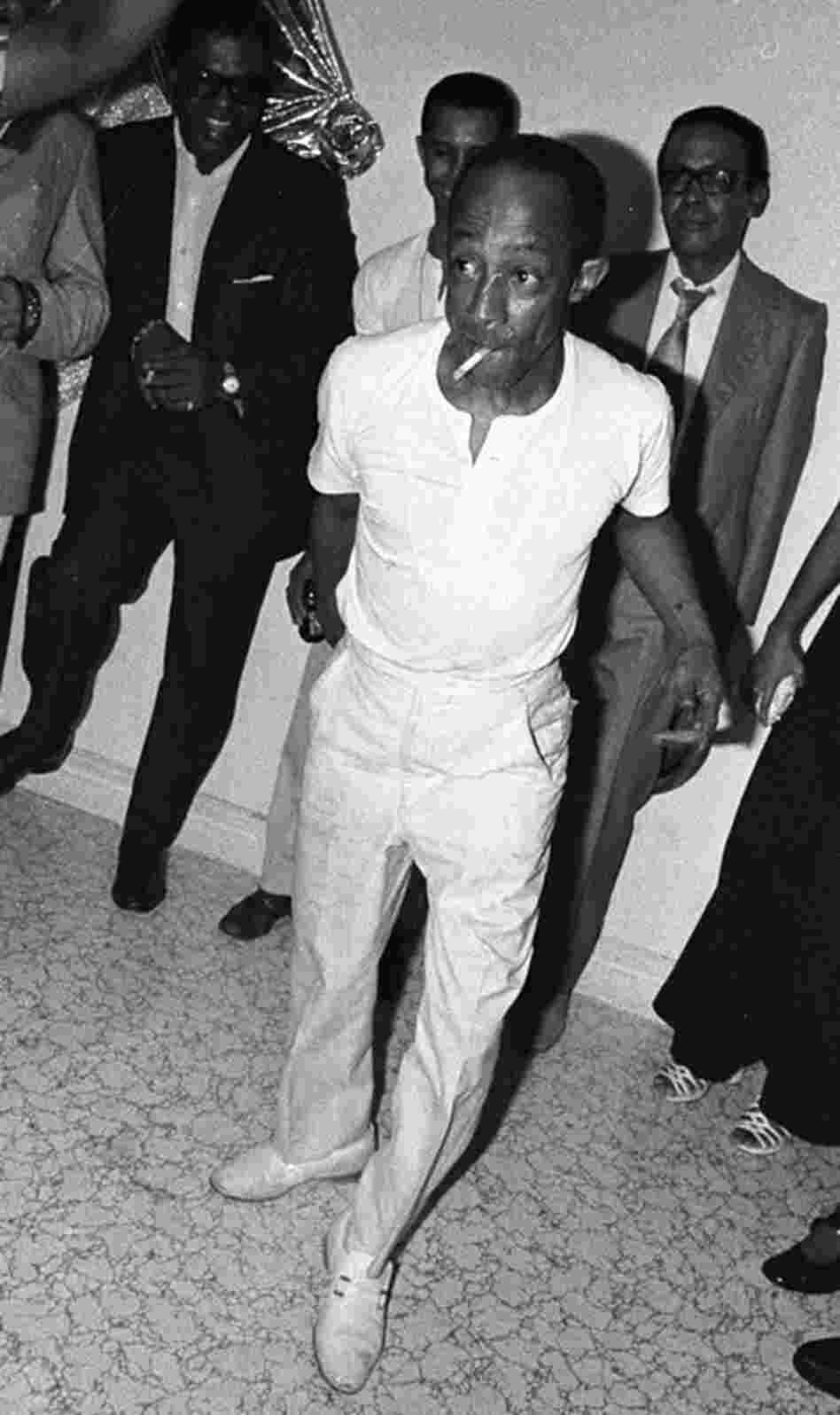 Percussionist Carlos "Patato" Valdes in his apartment on Timpson Place in the South Bronx caught in midstep while he performs a traditional Afro-Cuban rumba dance. It was at these apartment parties that I came to learn so much about the Afro-Cuban culture and the sound that percussionist needed.