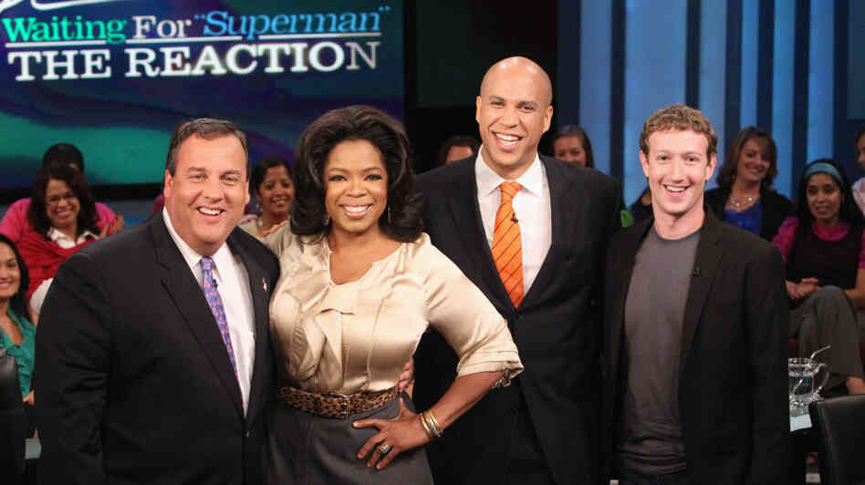 From left: N.J. Gov. Chris Christie, Oprah Winfrey, Newark Mayor Cory Booker, Mark Zuckerberg From left: N.J. Gov. Chris Christie, Oprah Winfrey, Newark Mayor Cory Booker, Mark Zuckerberg