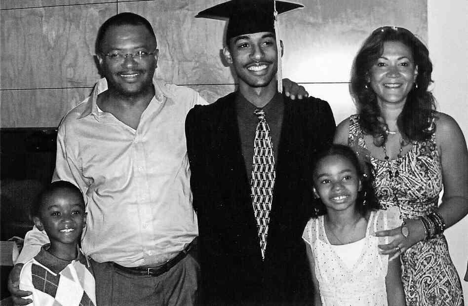 "One of the enduring sorrows of my life," Norris writes, "is that my father never met my husband or my children, pictured here on the day my stepson graduated from college." From left: son, Norris; husband, Broderick Johnson; stepson, Broddy; daughter, Aja; and Norris.