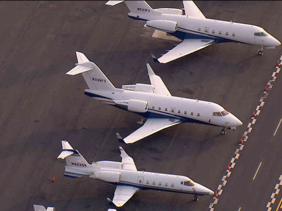 Row of private jets Row of private jets