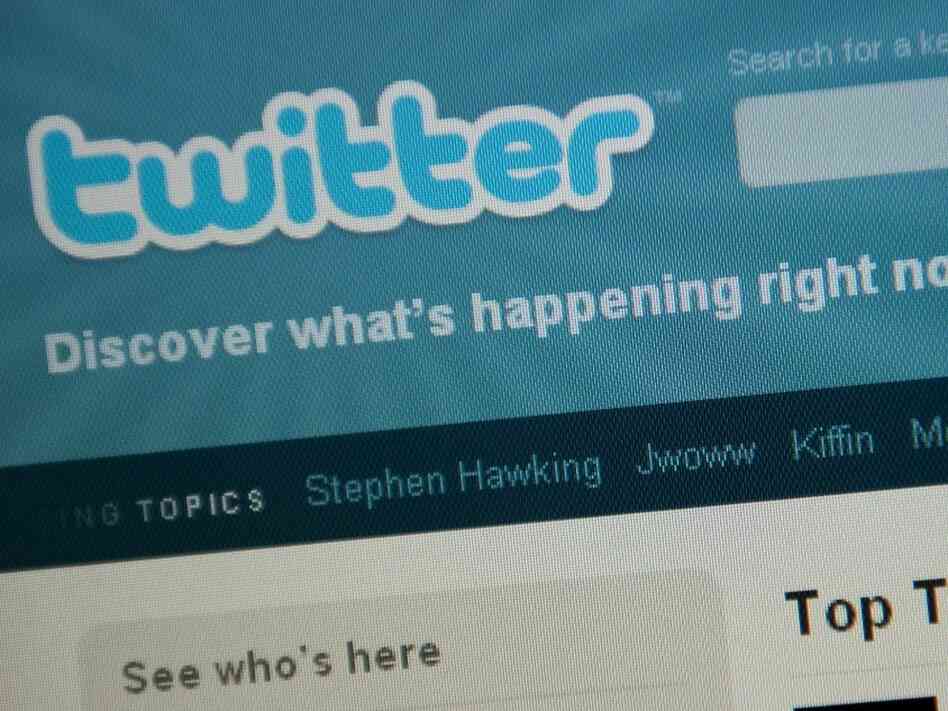 (FILES) The Twitter homepage appears on (FILES) The Twitter homepage appears on