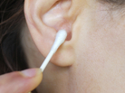 ear cleaning with cotton swab ear cleaning with cotton swab